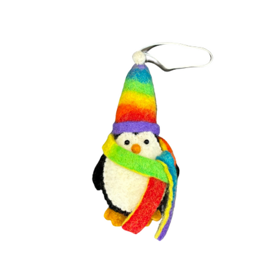 This Global Groove Life, handmade, ethical, fair trade, eco-friendly, sustainable, black and white penguin with colorful rainbow hat and scarf, 100% New Zealand wool felt ornament was created by artisans in Kathmandu Nepal and will be a beautiful addition to your Christmas tree this holiday season.