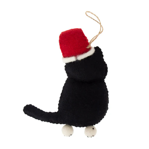 This Global Groove Life, handmade, ethical, fair trade, eco-friendly, sustainable, 100% New Zealand Wool, black and white and red, felt kitty ornament with Santa hat was created by artisans in Kathmandu Nepal and will be a beautiful addition to your Christmas tree this holiday season.