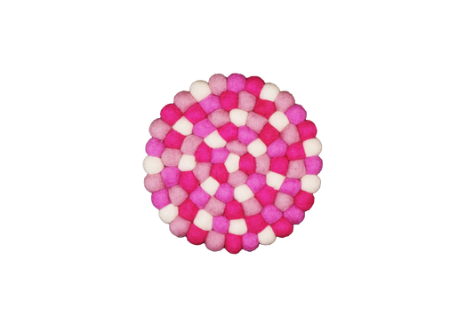 This Global Groove Life, handmade, ethical, fair trade, eco-friendly, sustainable, Pink & white 100% New Zealand wool felt coaster was created by artisans in Kathmandu Nepal and will bring colorful warmth and functionality to your table top.